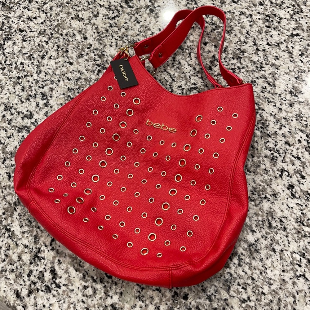 NEW Bebe red leather purse with gold grommets